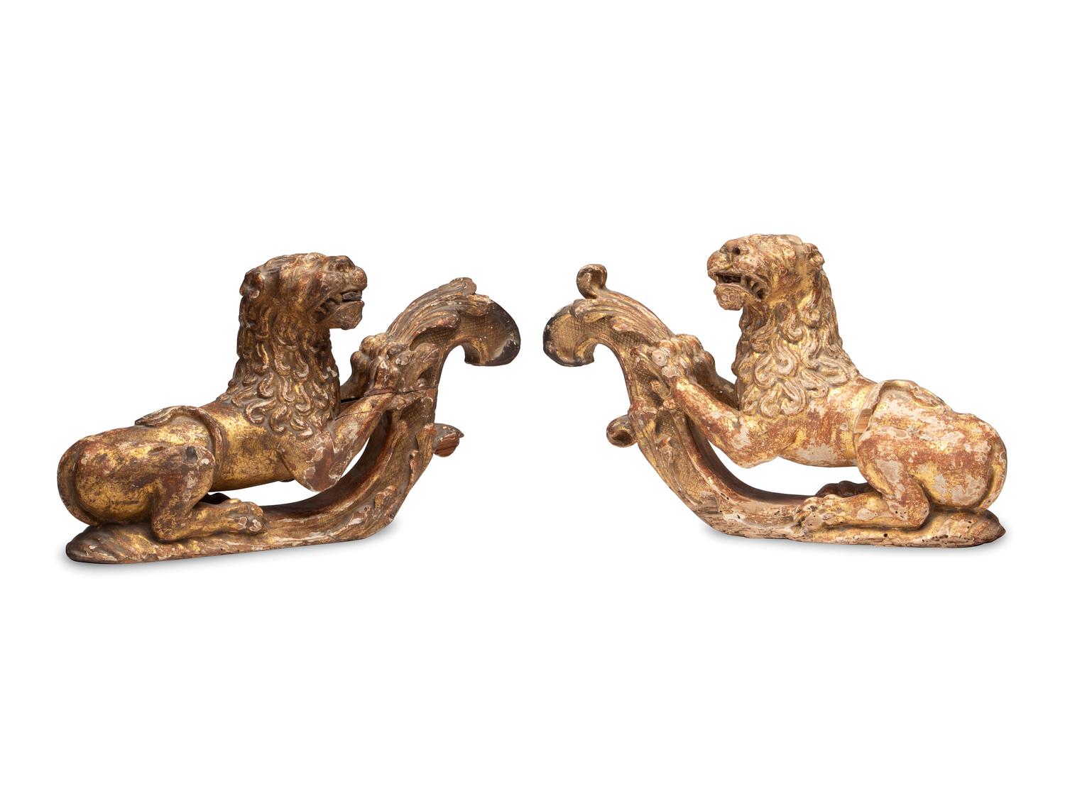 A Pair of Regency Giltwood Lion Mounts