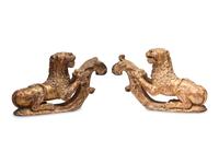 A Pair of Regency Giltwood Lion Mounts