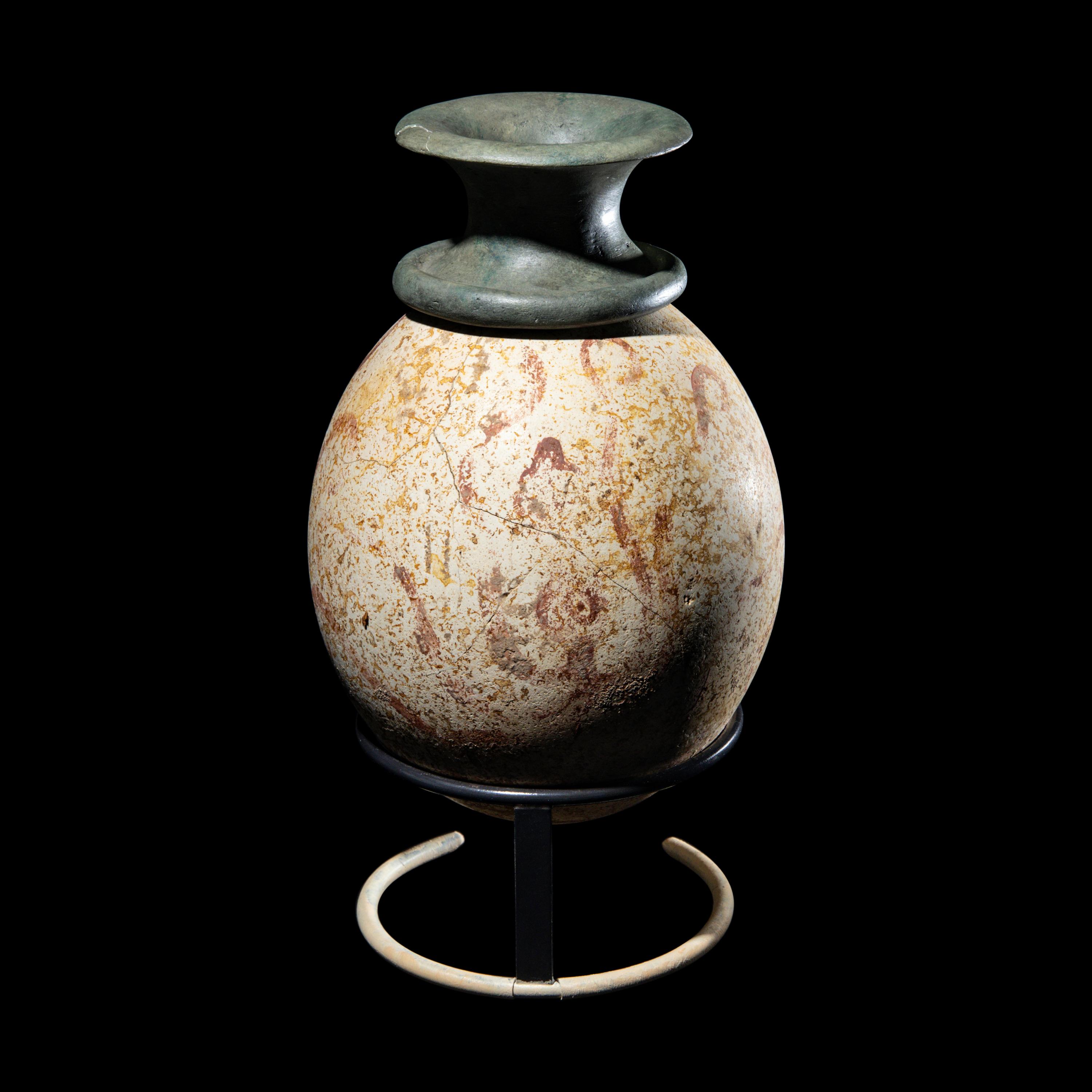 A Minoan or Mycenaean Painted Ostrich Egg Rhyton