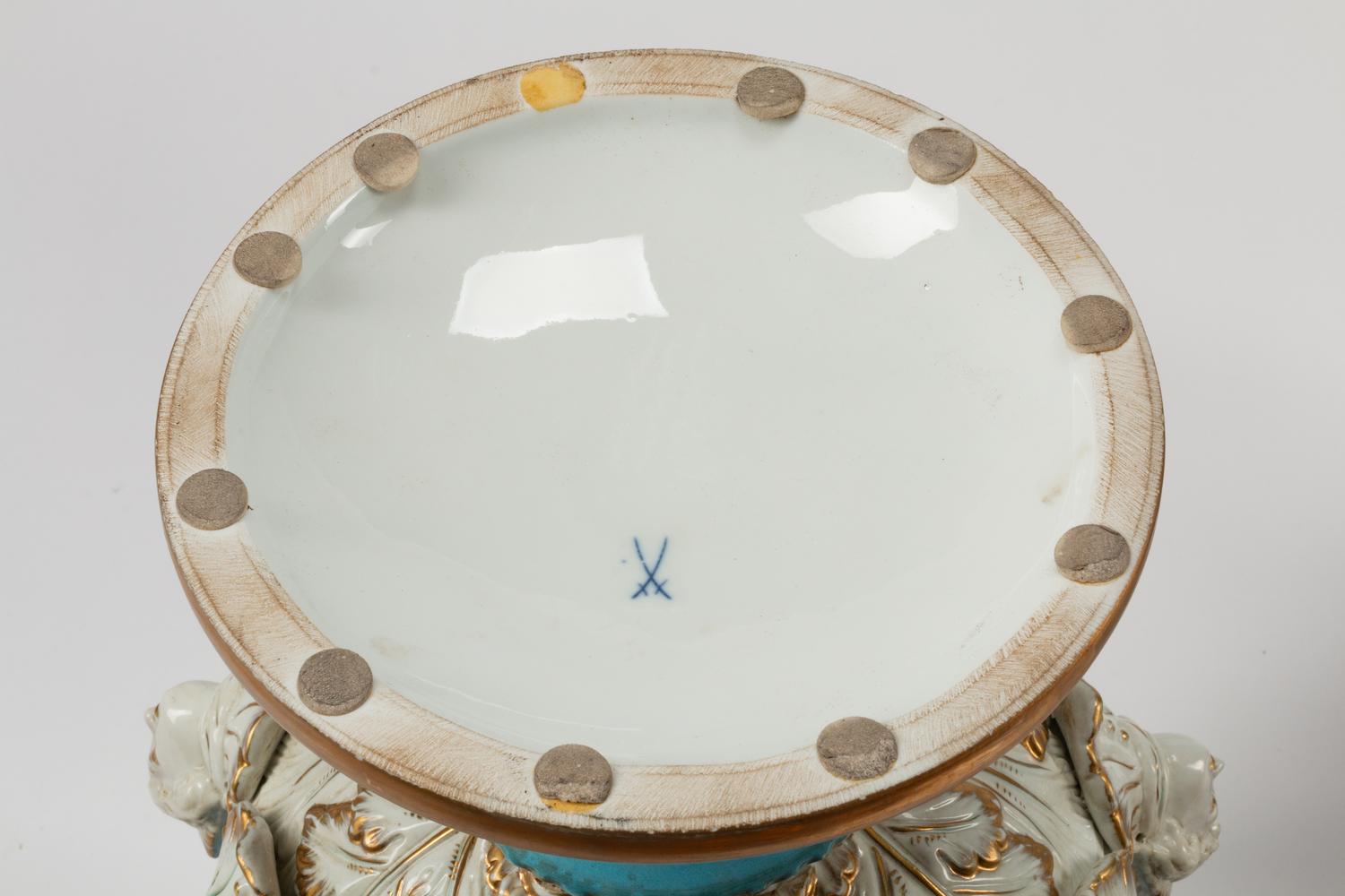 A Pair of Sèvres Style Porcelain Urns