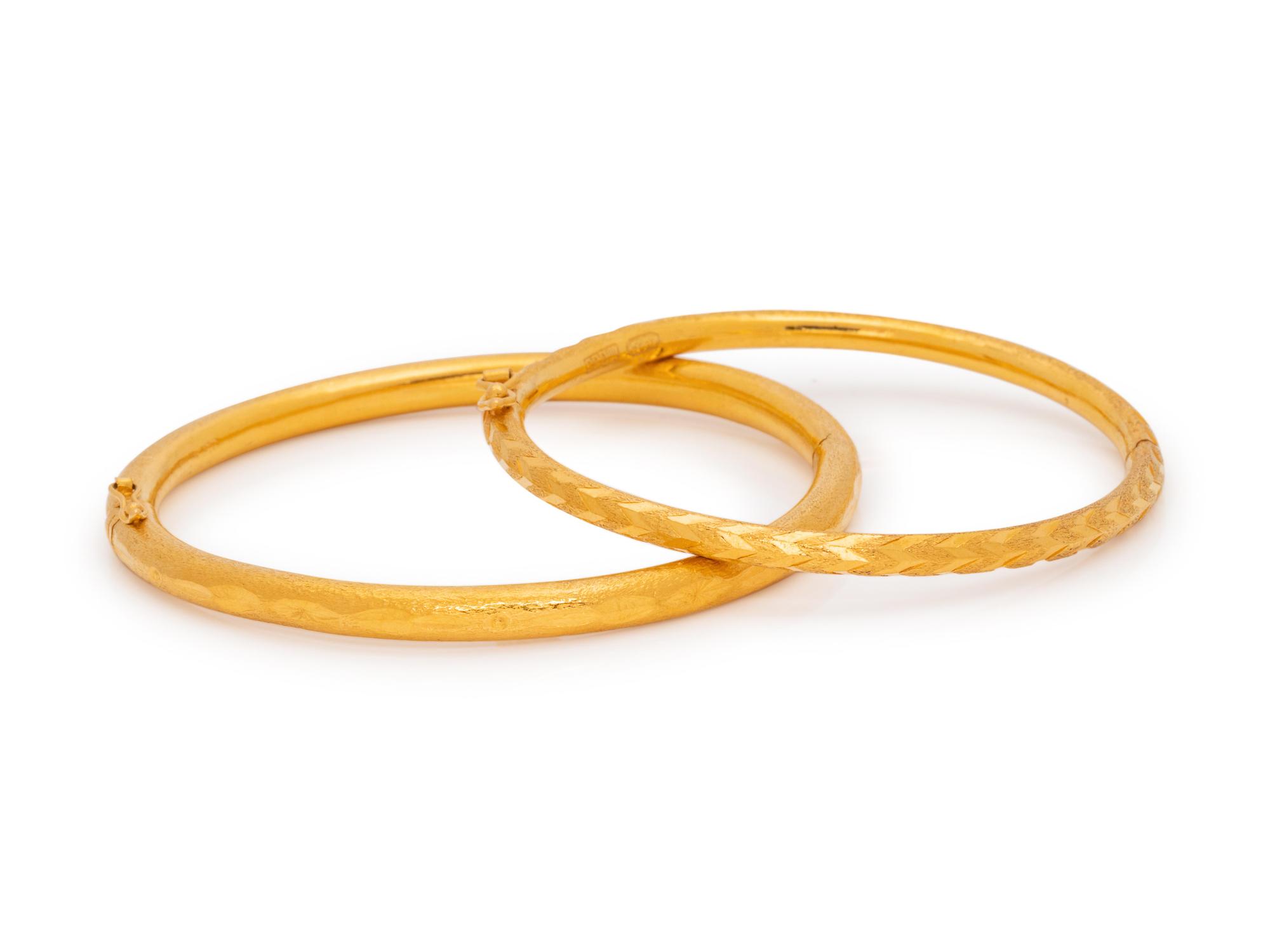A Collection of High Karat Gold Bangle Bracelets,