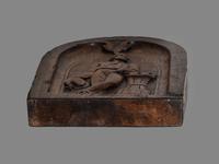 A Carved Walnut Ship Board Panel of a Sailor