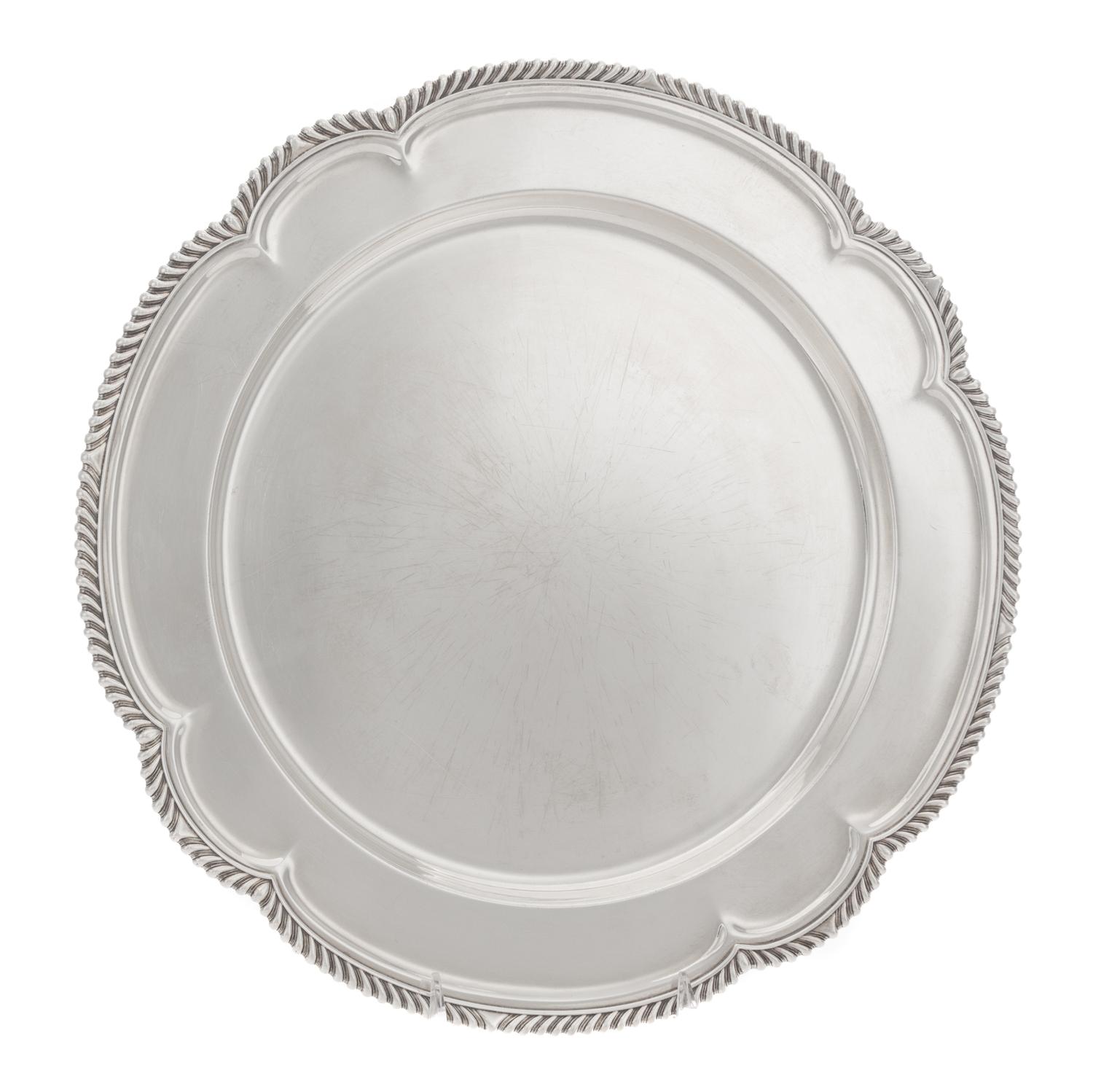 An American Silver Meat Platter, Gorham Mfg. Co., Providence, RI, 1943, of shaped circular form having a gadrooned border, the center e