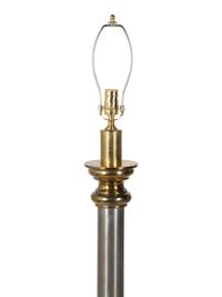 A Steel and Brass Floor Lamp — 20TH CENTURY