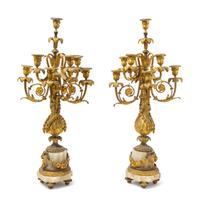 A Pair of Louis XVI Style Gilt Bronze and Onyx Eight-Light Candelabra