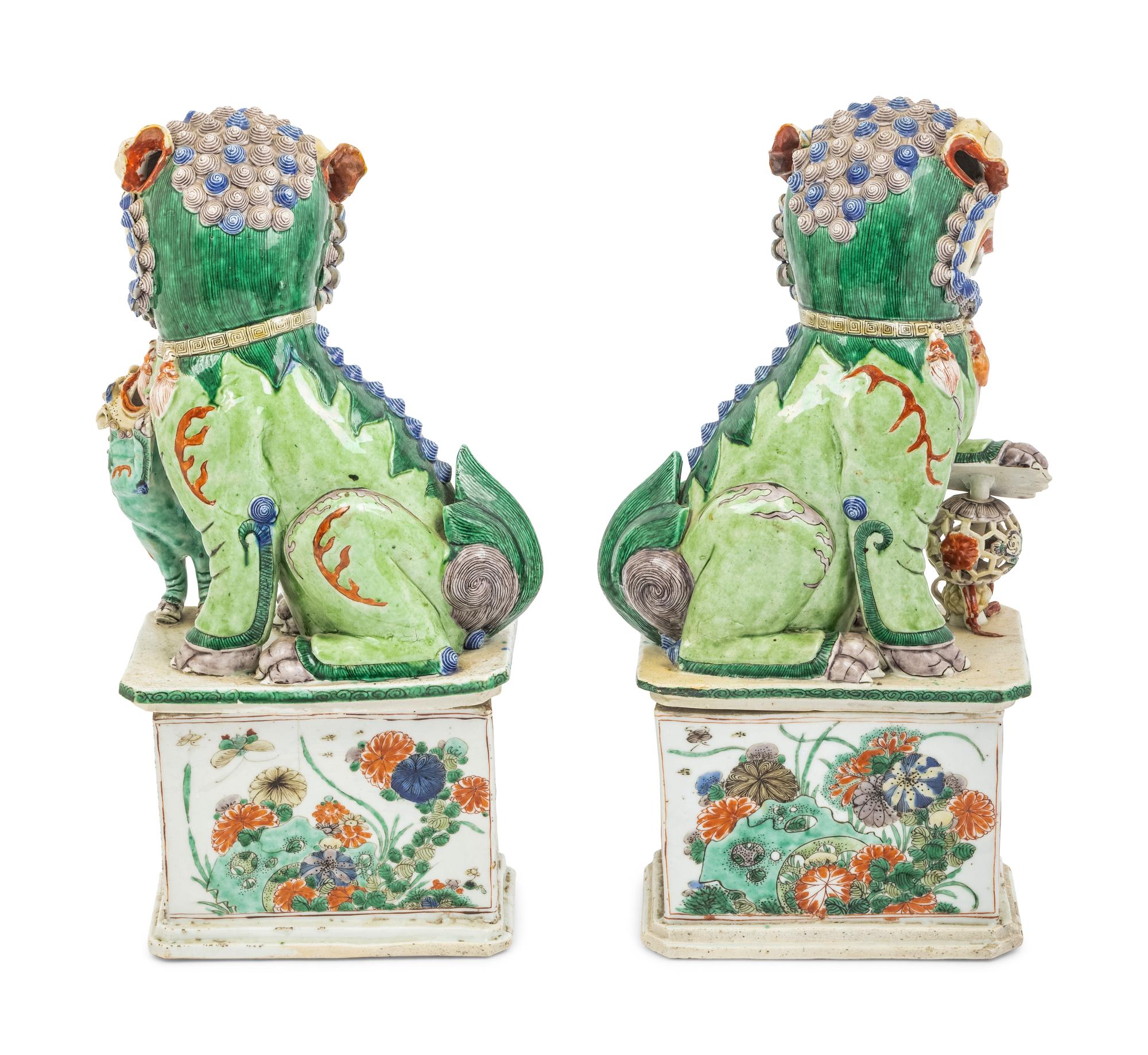 A Pair of Famille Verte Porcelain Figures of Fu Lions