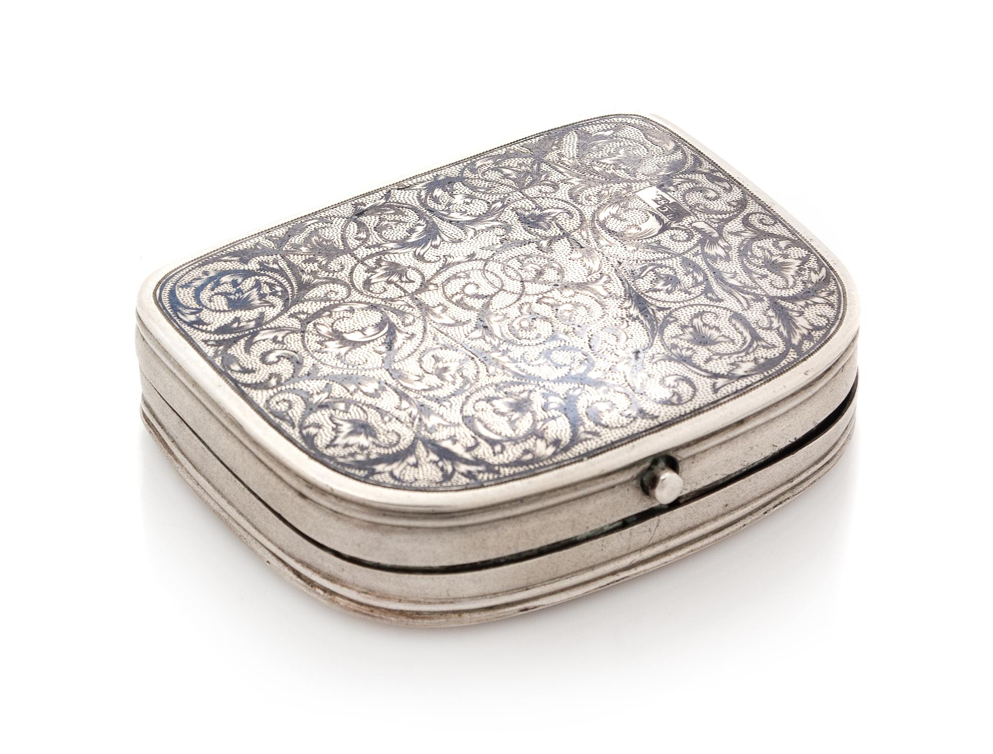 A Russian Silver and Niello Change Purse, Maker's Mark Obscured, Moscow, Second Half 19th Century, the case worked to show foliate deco