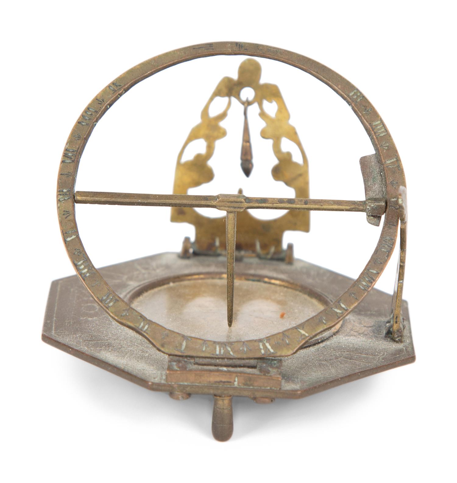 An English Brass Lantern Clock and A Sundial/Compass