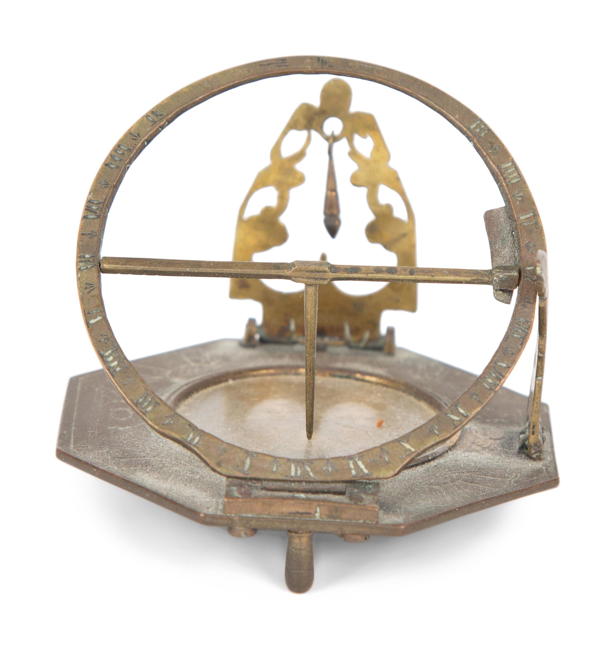 An English Brass Lantern Clock and A Sundial/Compass