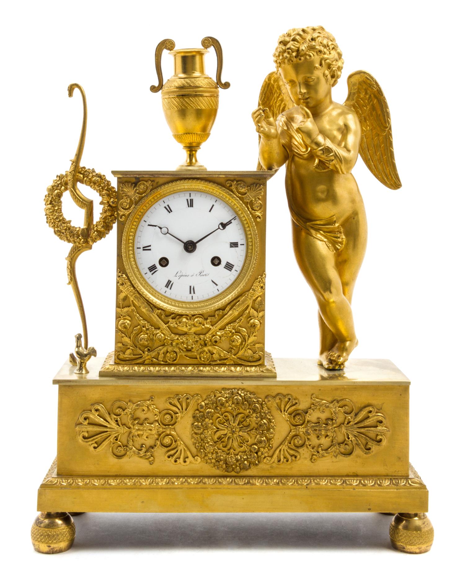 A French Gilt Bronze Figural Mantel Clock Height 15 1/4 inches. — 19TH CENTURY