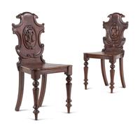 A Pair of Regency Style Oak Hall Chairs