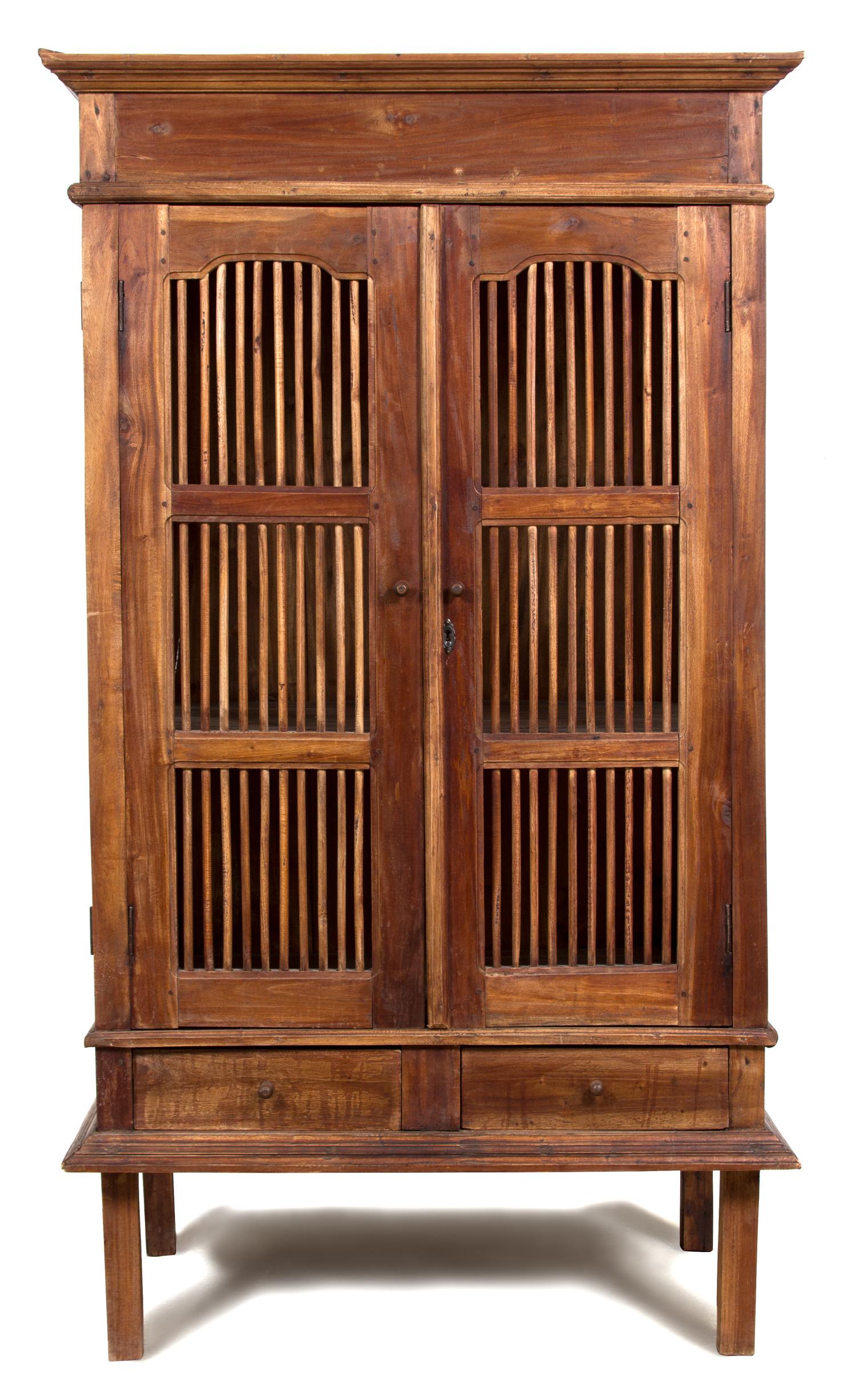 A Javanese Teak Two Door Cabinet Height 69 x width 39 x depth 24 inches. — 20TH CENTURY