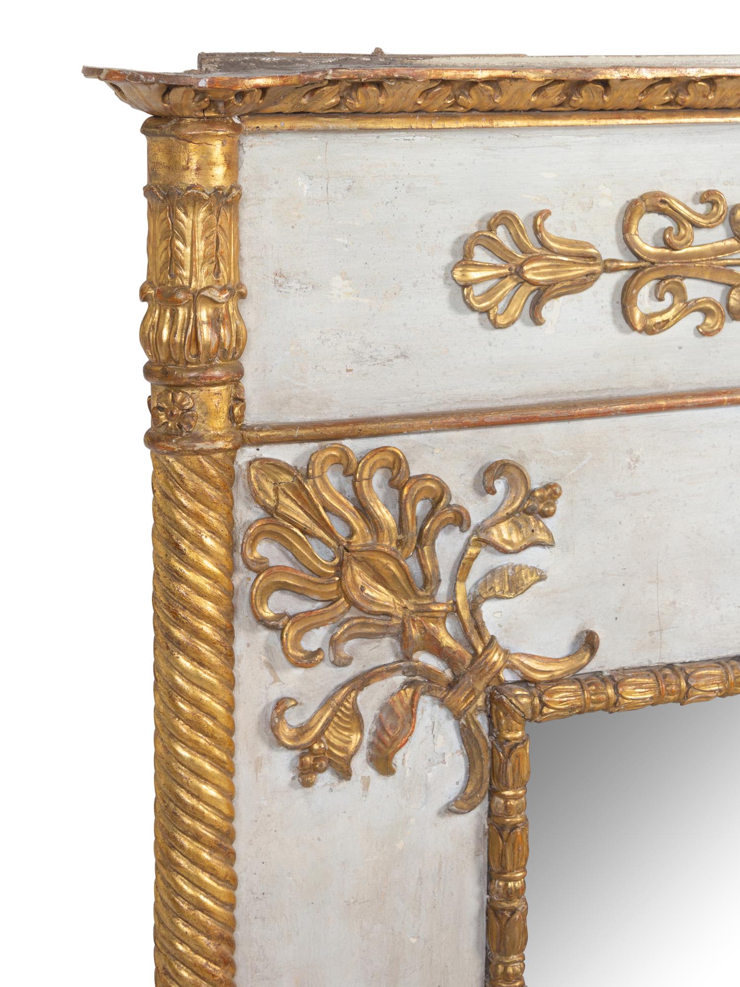 A Regency Painted and Parcel Gilt Mirror