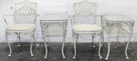 A Woodard Enameled Patio Set Height of circular table 18 x diameter 36 1/4 inches.