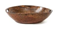 An Ash Dough Bowl Height 5 x width 19 x depth 14 inches.