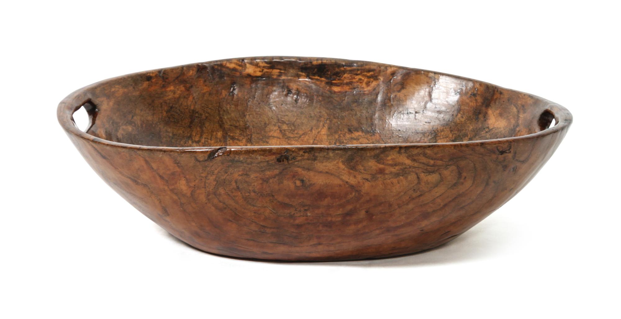 An Ash Dough Bowl Height 5 x width 19 x depth 14 inches.