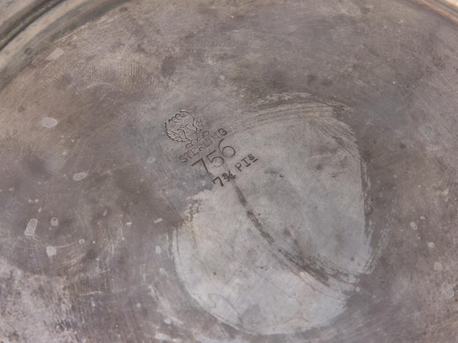 An American Sterling Silver Repousse Water Pitcher
