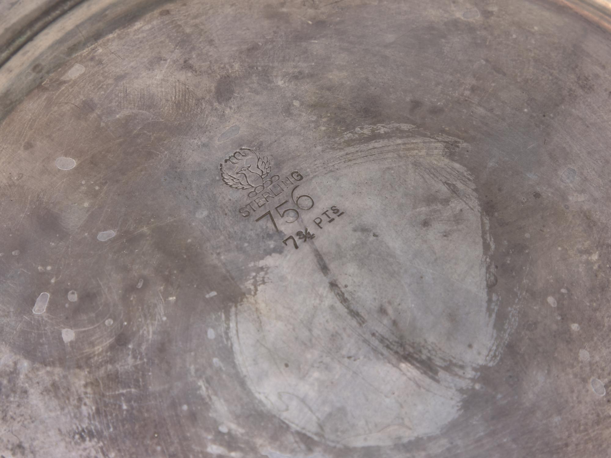 An American Sterling Silver Repousse Water Pitcher