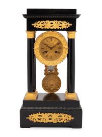 An Empire Style Gilt Bronze Mounted Ebonized Portico Clock