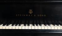 A Steinway and Sons Black Lacquer Baby Grand Piano