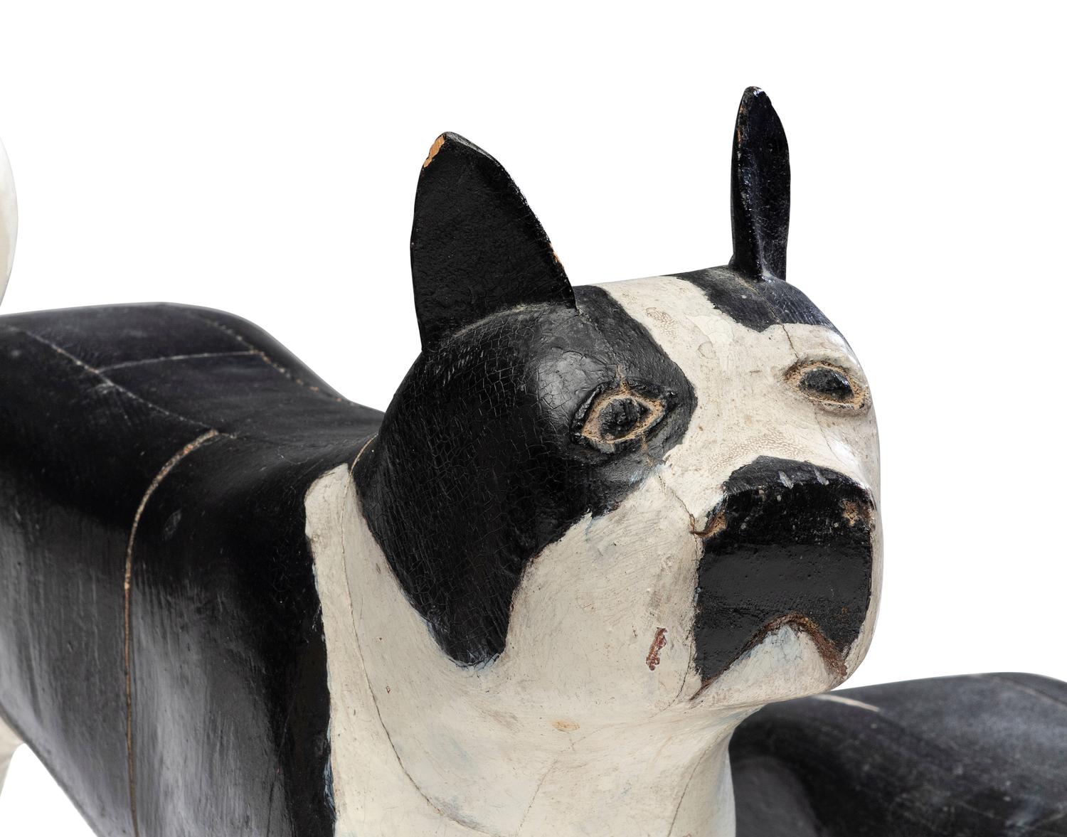 A Set of Four Carved and Painted Wood Boston Terrier Figures