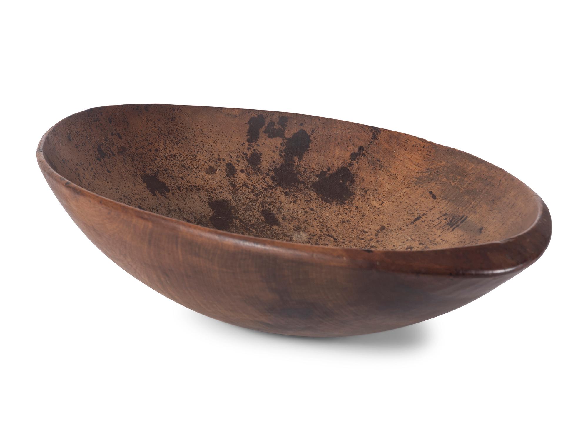 A Large Wooden Oval Dough Bowl