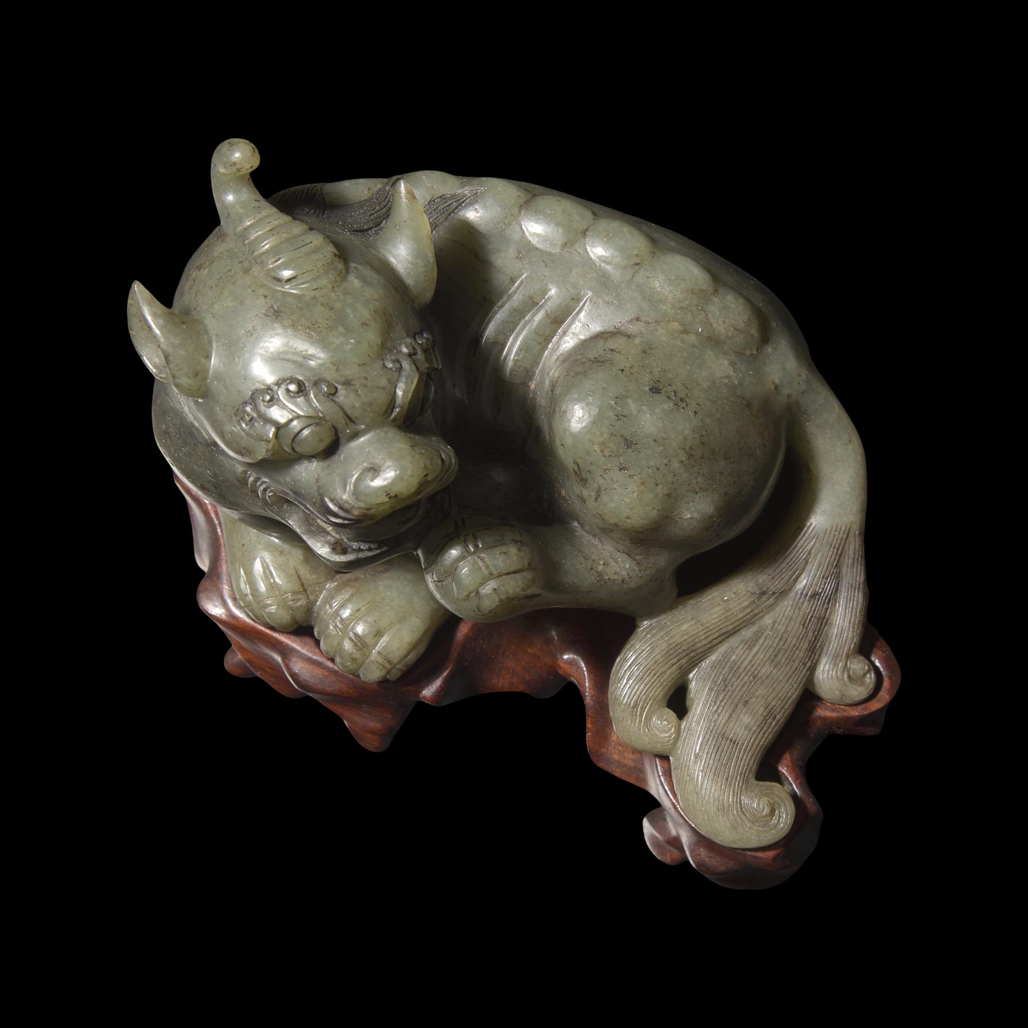 A Chinese Carved Sage Green Jade Mythical Beast, Bixie 青玉辟邪