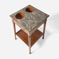 A Directoire walnut rafraîchissoir with Lumachella di San Vitale marble top circa 1800