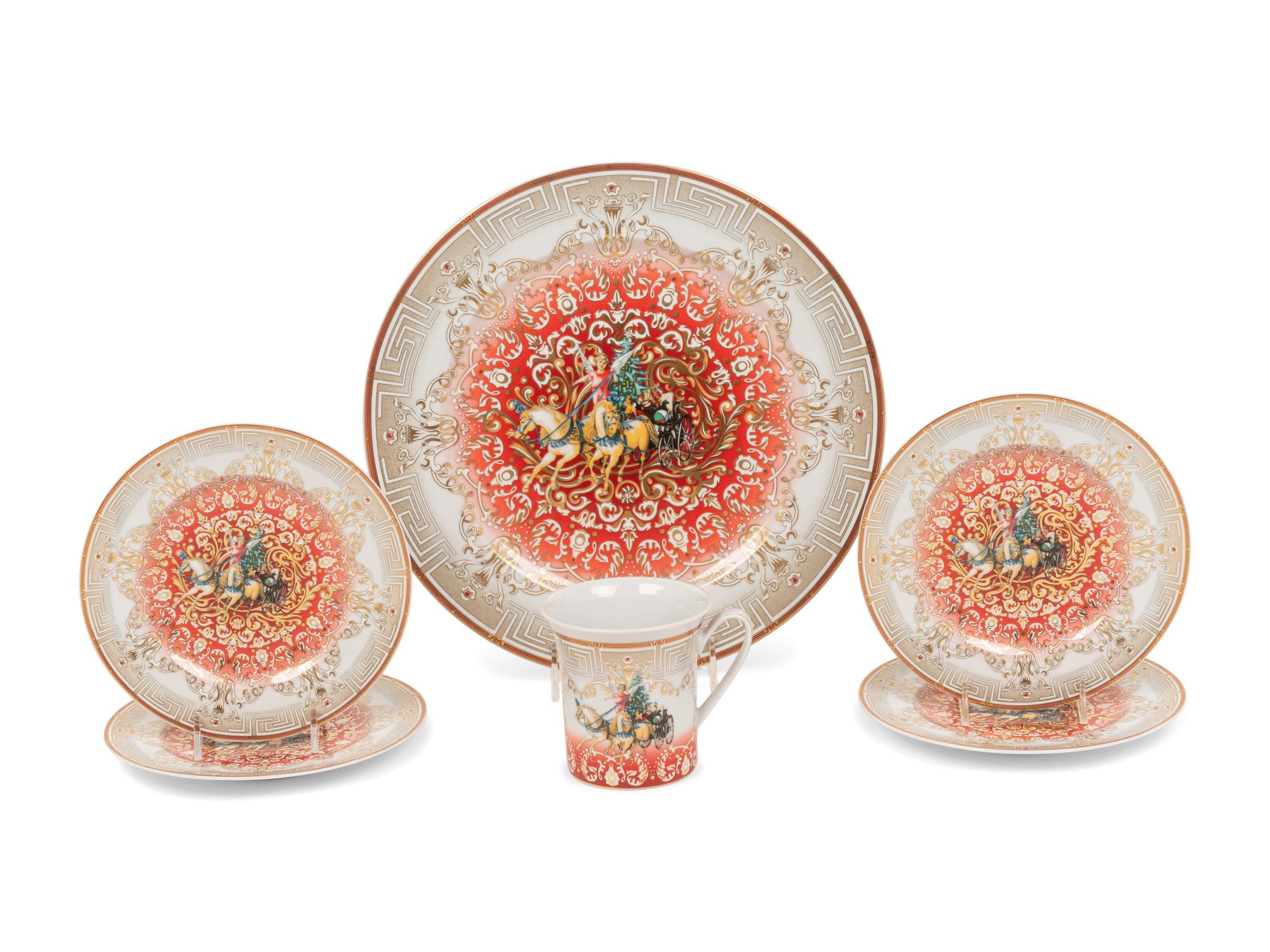 A Group of Versace Christmas Chariot Porcelain Table Articles