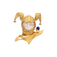 CHAUMET, YELLOW GOLD, LAPIS LAZULI, AND MOTHER-OF-PEARL 'LE SPECTACLE DU MONDE' HARLEQUIN BROOCH