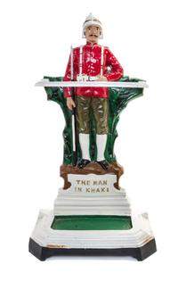 A Victorian Painted Iron Figural Umbrella Stand Height overall 28 inches.