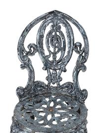 A Set of Four Wrought Iron Chairs