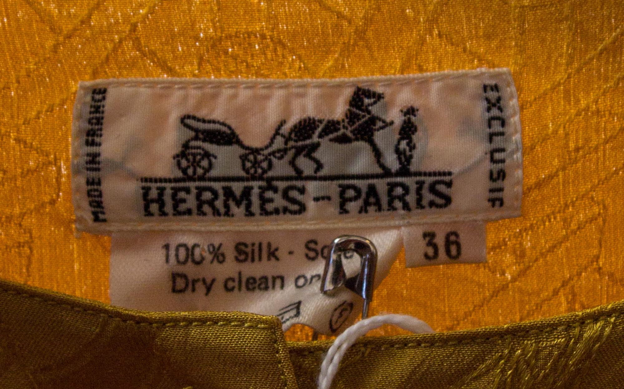 An Hermes Yellow Silk Printed Blouse, Size 36.
