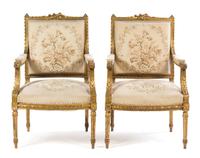 A Pair of Louis XVI Style Giltwood Fauteuils Height 38 x width 24 1/2 x depth 19 inches. — 19TH CENTURY
