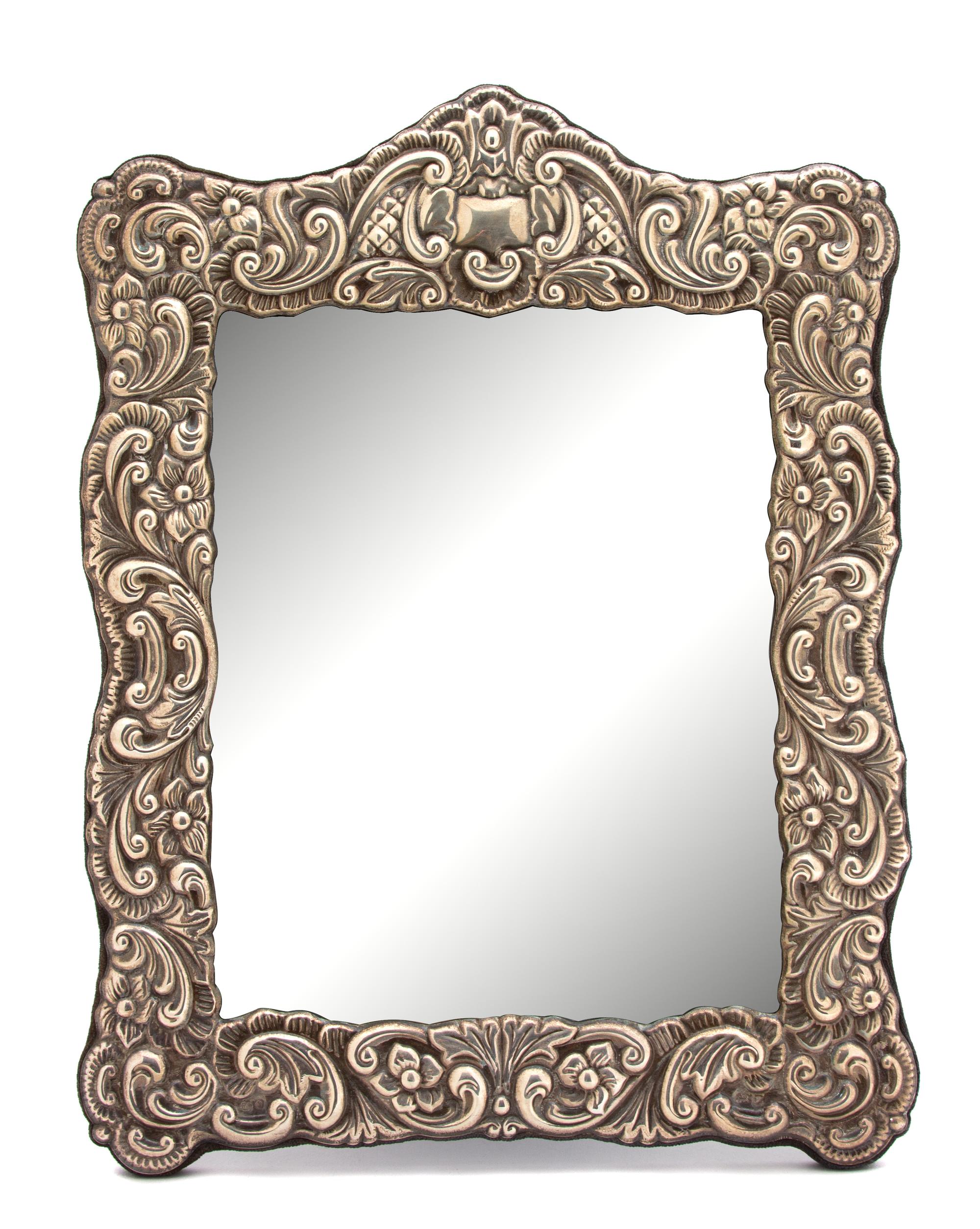 An English Silver Repousse Mounted Easel-Back Mirror, R. Carr Ltd., Sheffield, 1989,