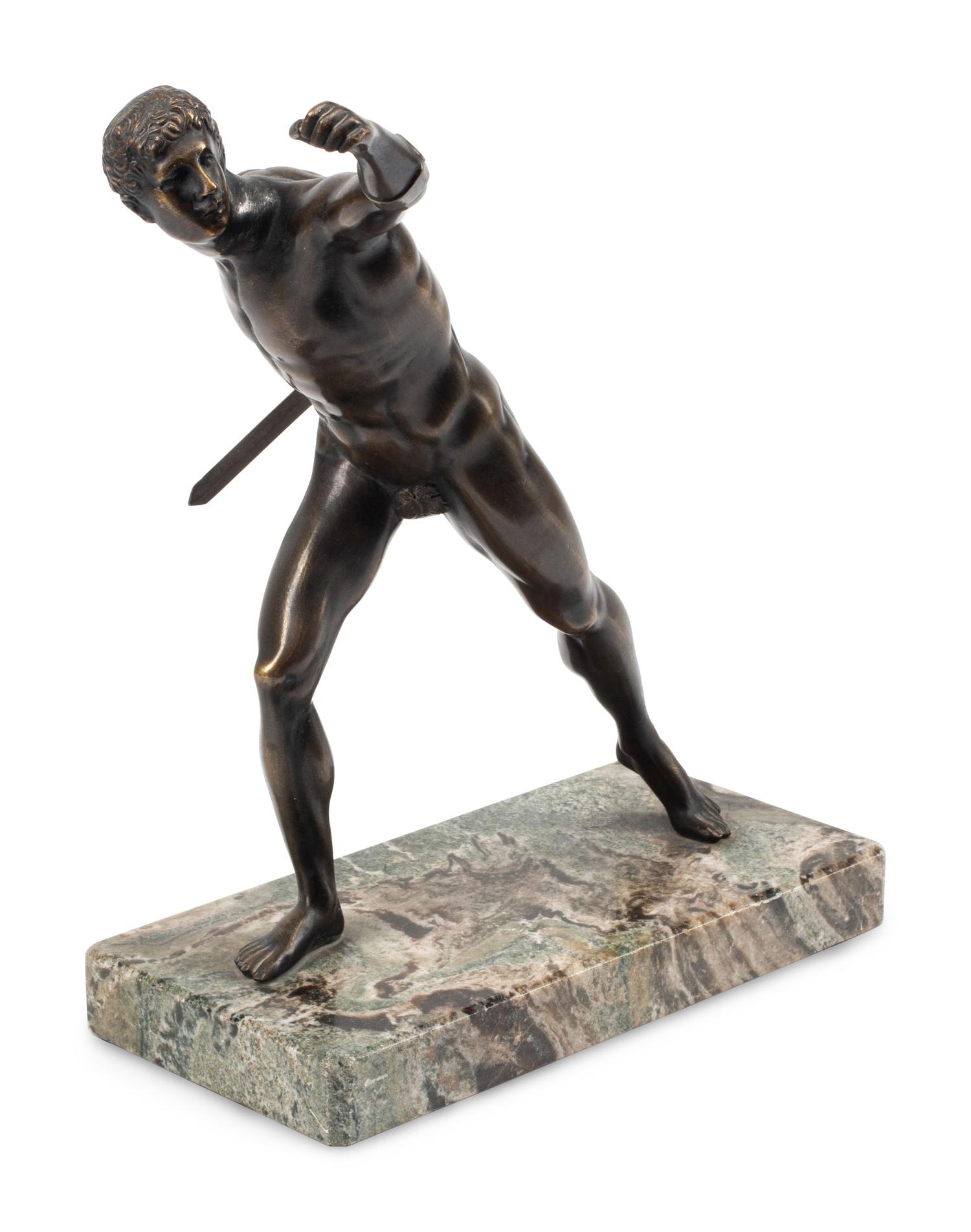 A Grand Tour Bronze Figure on a Marble Base