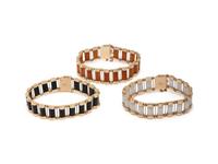 COLLECTION OF YELLOW GOLD AND JADE BRACELETS