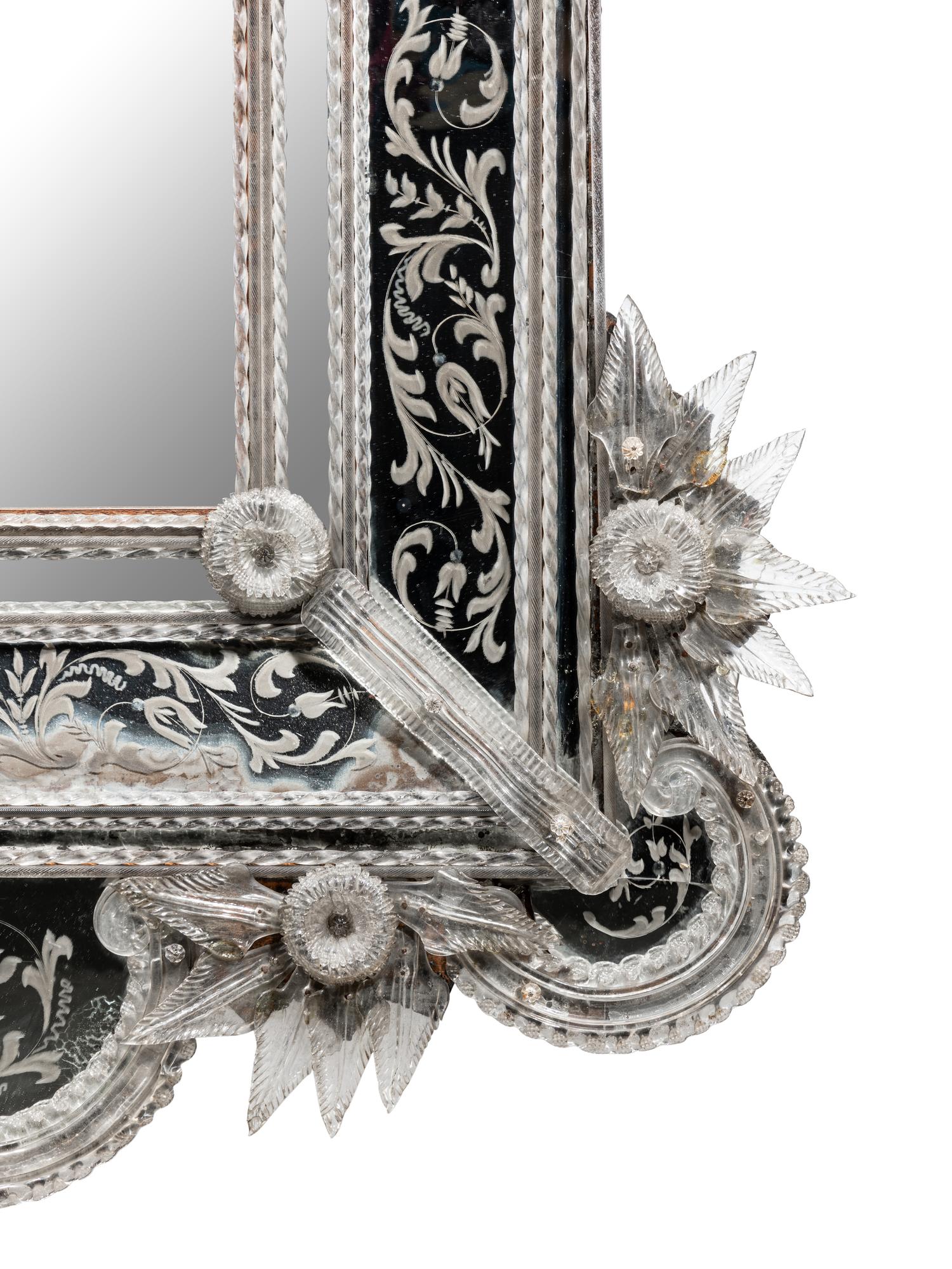 A Venetian Blown and Etched Glass Mirror