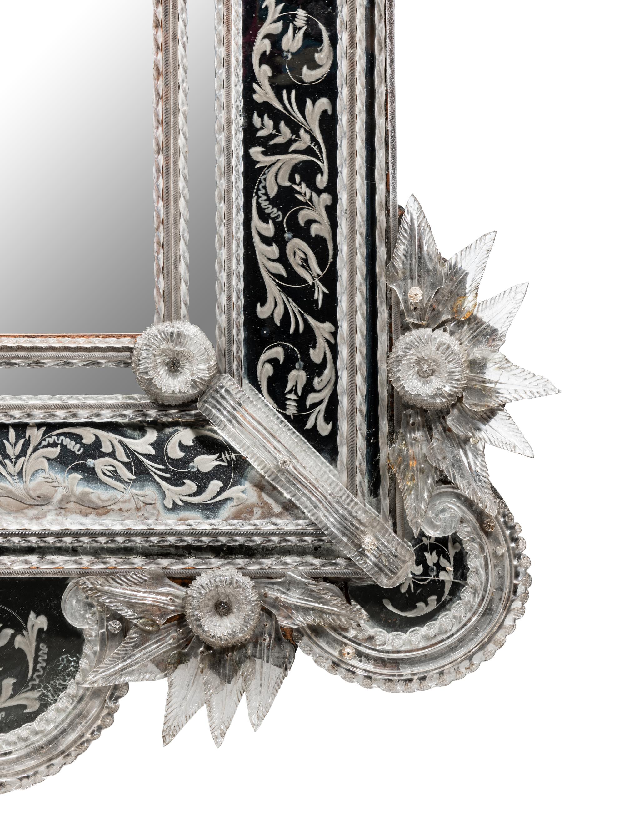 A Venetian Blown and Etched Glass Mirror