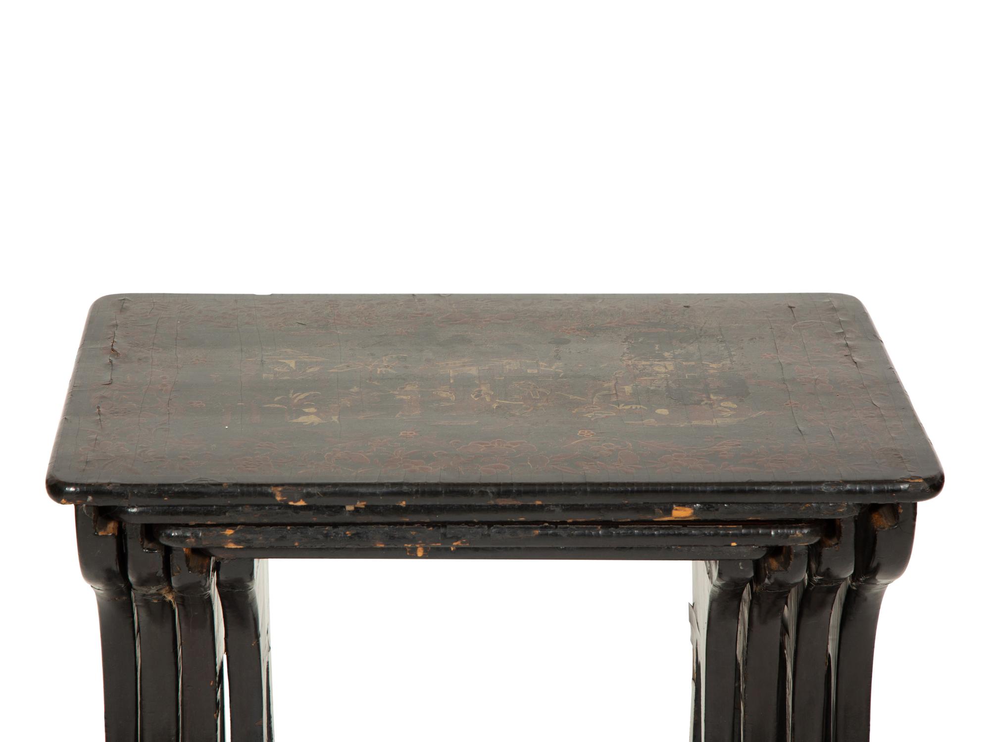 A Set of Four Victorian Chinoiserie Lacquered Nesting Tables