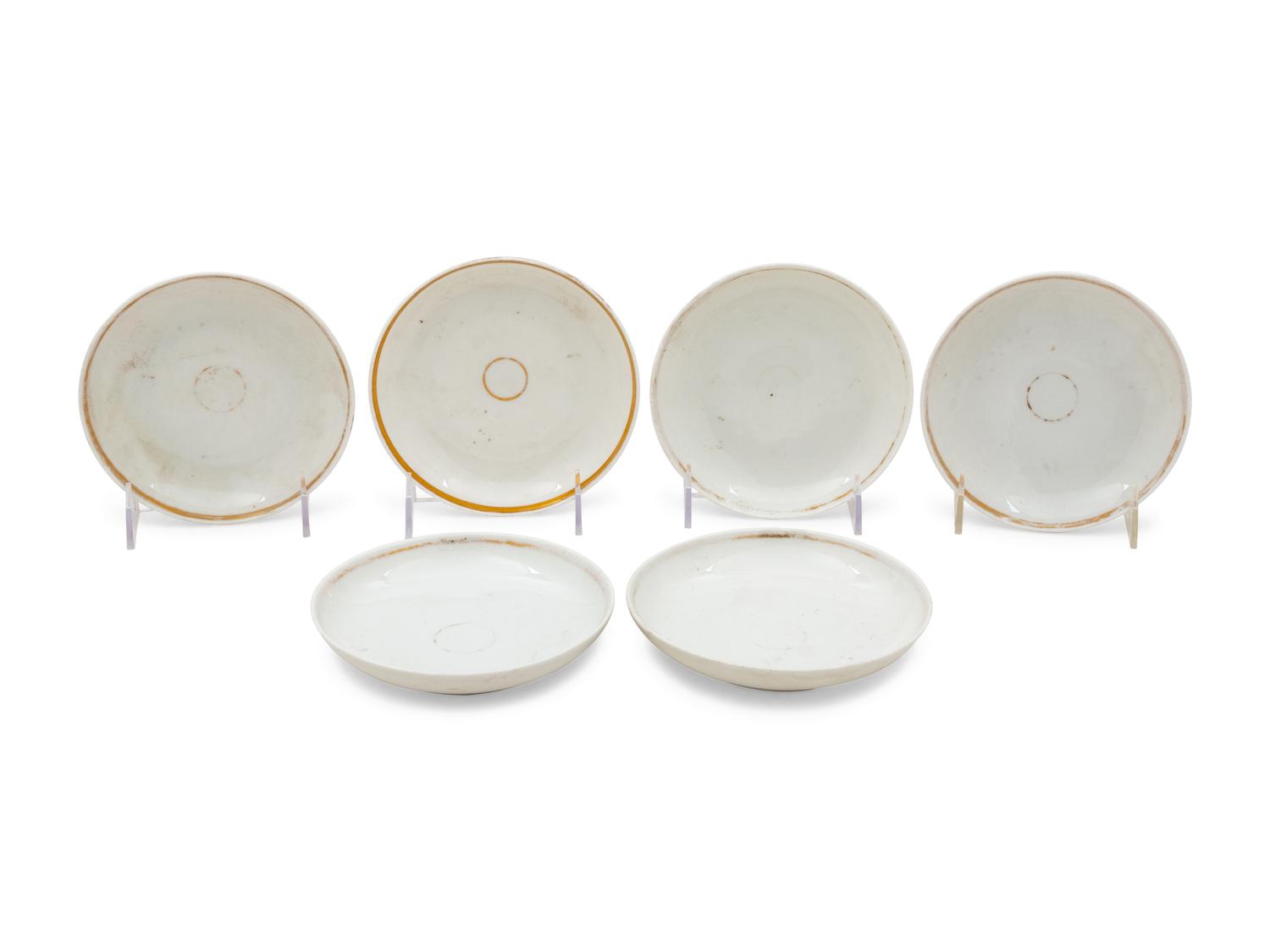 A Collection of Transfer Decorated Cups and Saucers