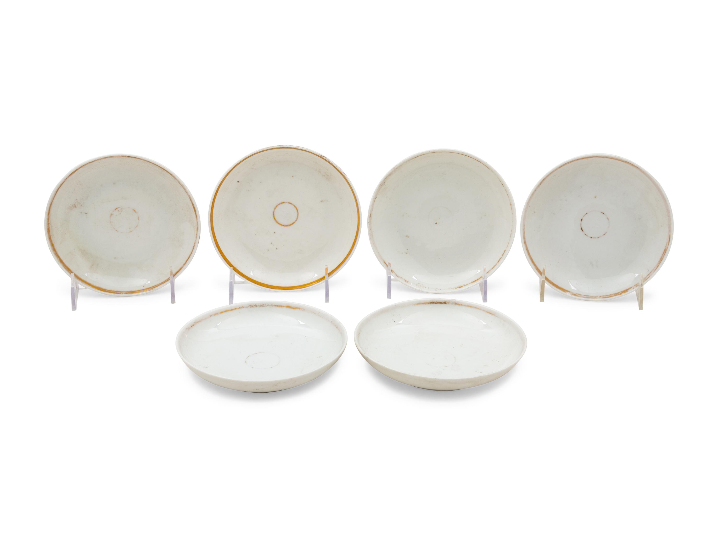 A Collection of Transfer Decorated Cups and Saucers