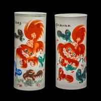 Two Chinese Iron Red and Polychrome Enameled Porcelain 'Fu Lions' Hat Stands
