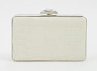 A Judith Leiber Cream Crocodile Clutch, 6" x 3.5" x 1.5".