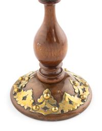 A Pair of Victorian Brass and Walnut Candlesticks