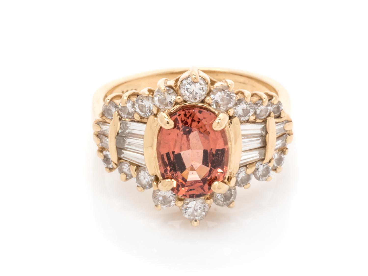 A 14 Karat Yellow Gold, Garnet and Diamond Ring,
