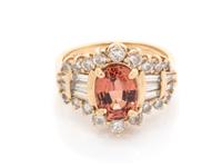 A 14 Karat Yellow Gold, Garnet and Diamond Ring,