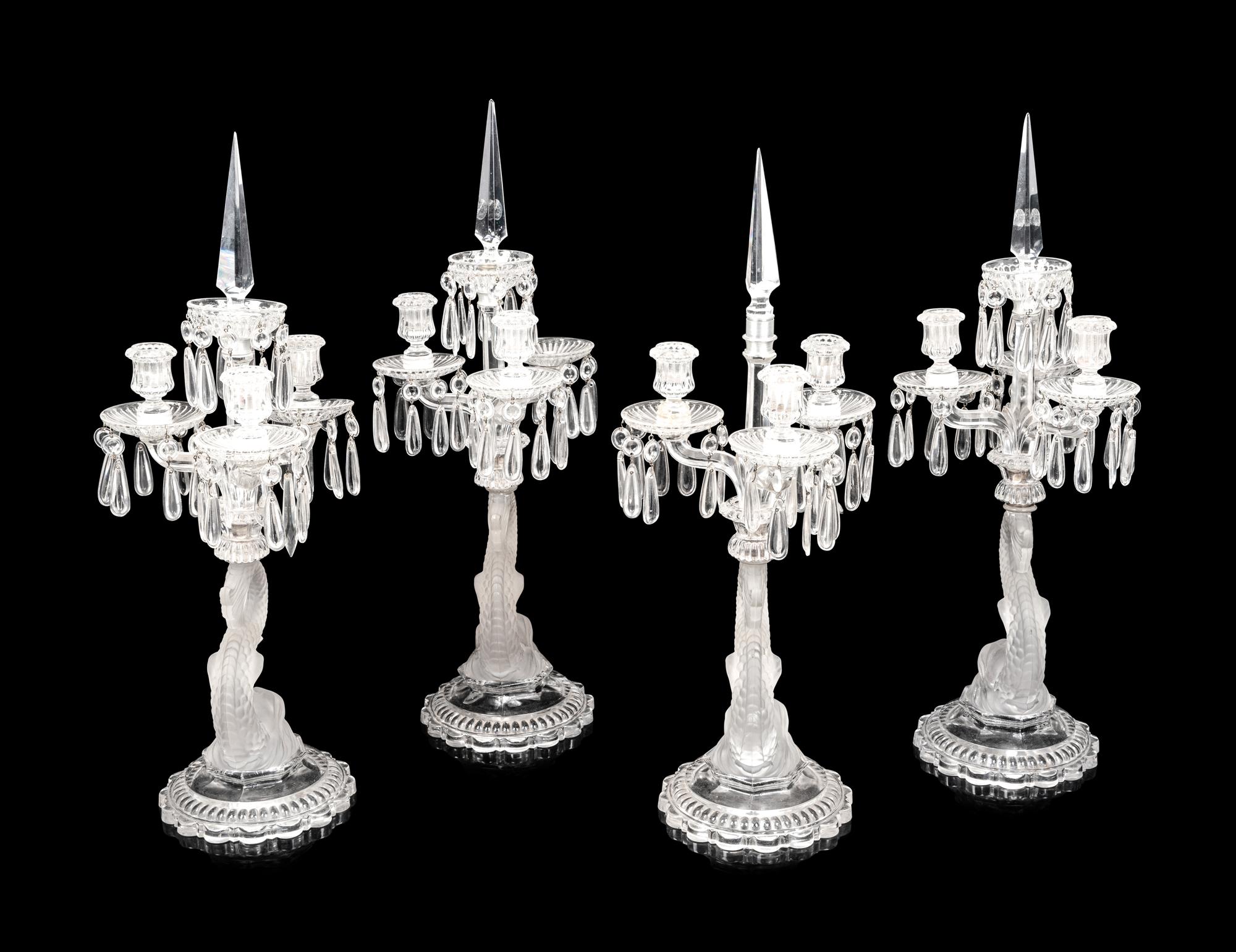 A Set of Four Baccarat Dauphin Three-Light Candelabra