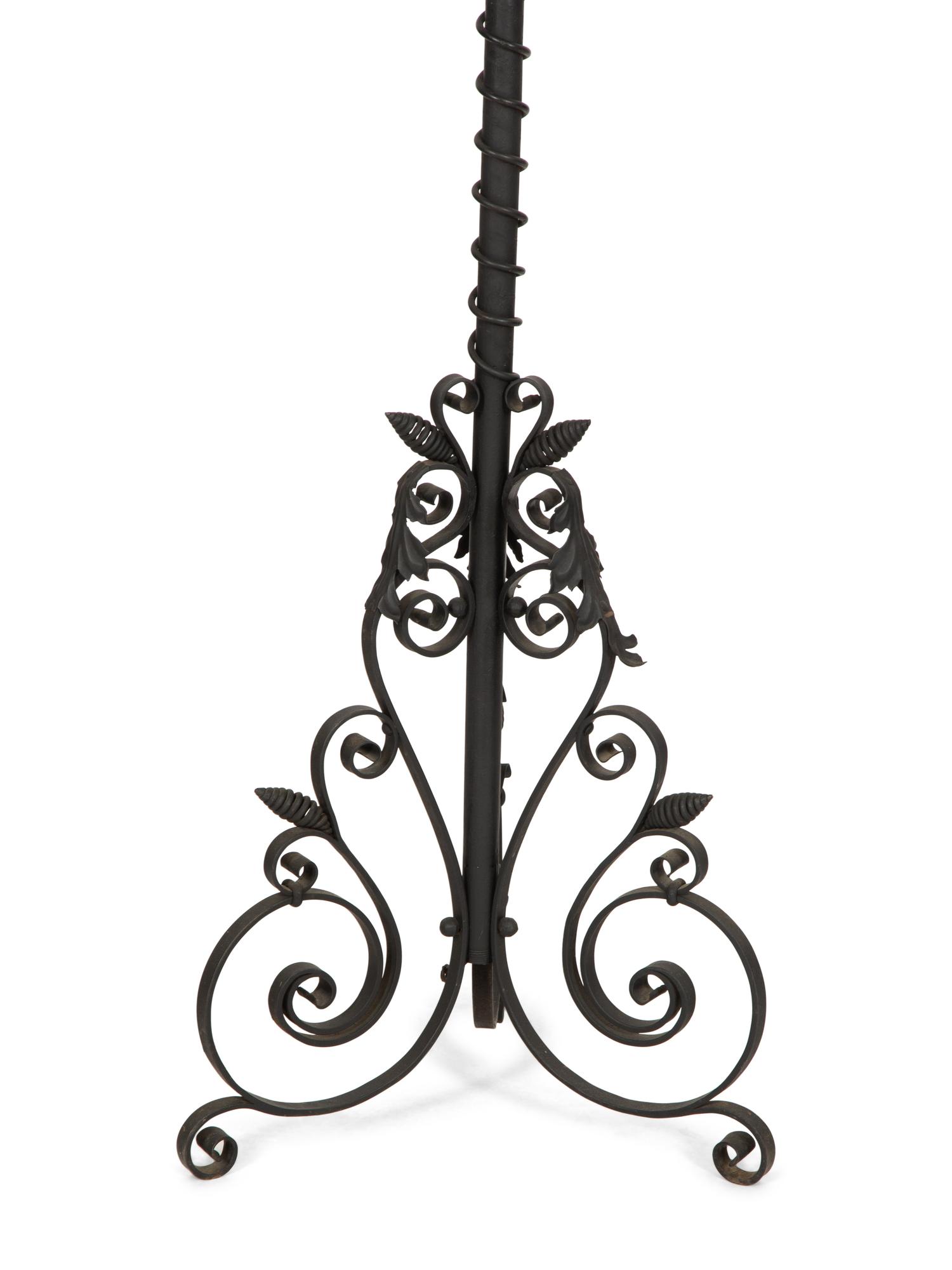A Painted Wrought Iron Torchère Mounted as a Floor Lamp