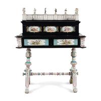 A German Ebonized and Porcelain Mounted Bureau